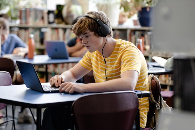 Student on laptop in class