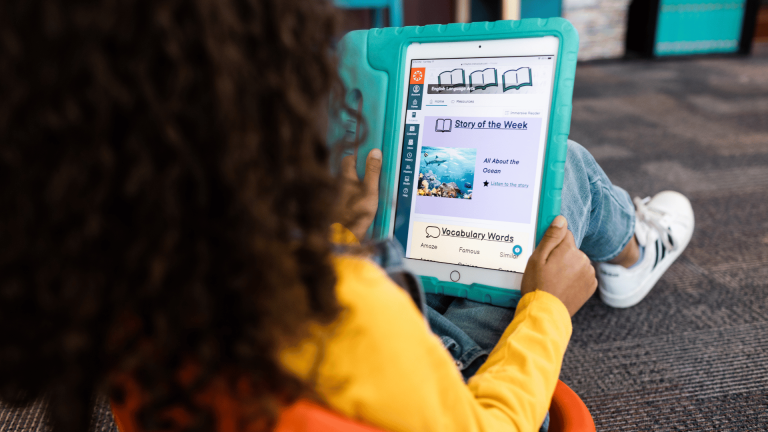 A young female student on a tablet