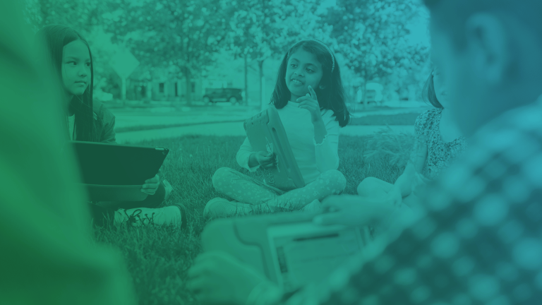 students sitting in a circle with chromebooks and a green and blue overlay