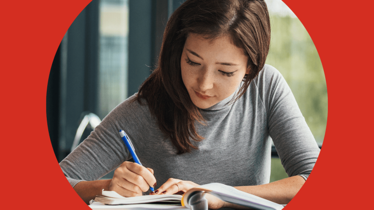 Woman writing in a notebook